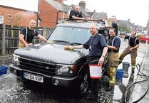 Firefighters awash with dirty cars!