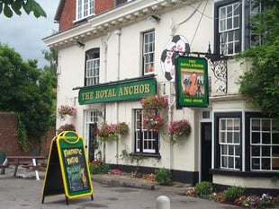 Homes approved behind village pub despite Parish objections