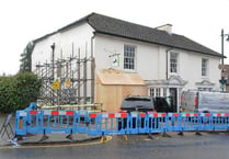 Bank reopens after ram raid