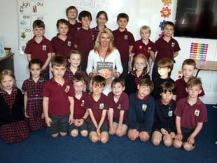 Pig tales leave pupils happy...