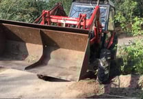 VIDEO: Watch the moment a tractor driver runs down his neighbour in a Churt country lane