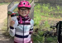 Schoolgirl Darcy, 6, rides 20km to support fire-hit common