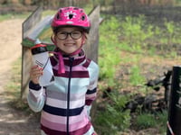 Schoolgirl Darcy, 6, rides 20km to support fire-hit common
