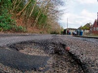 Don't just report potholes - protest