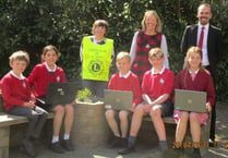 Binsted pupils get laptops from Lions