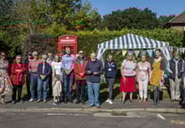Chiddingfold phone box swaps roles