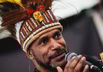 Independence movement leader giving talk at school