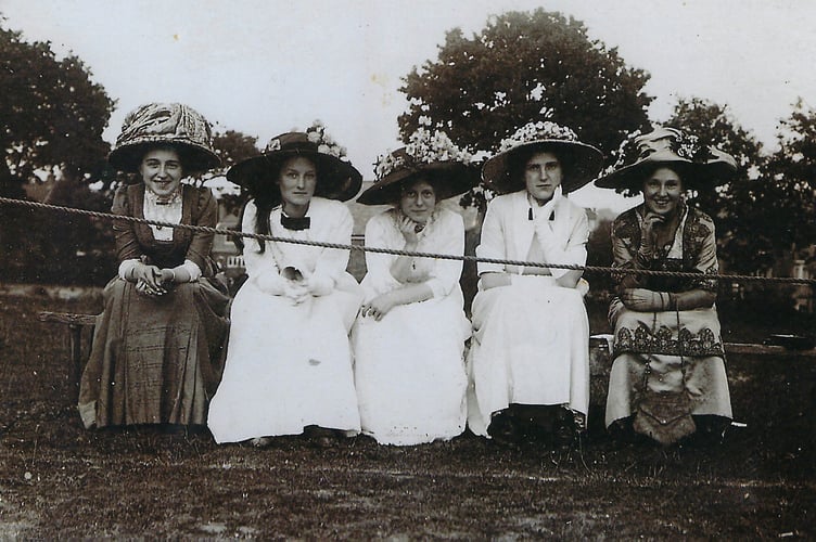 Violet Furlonger, in the middle of this group of friends.