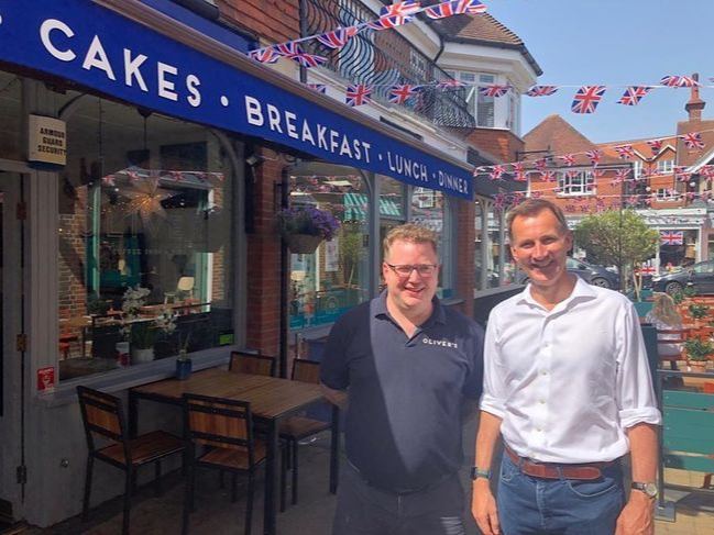 MP Jeremy Hunt with cafe owner Oliver Leach