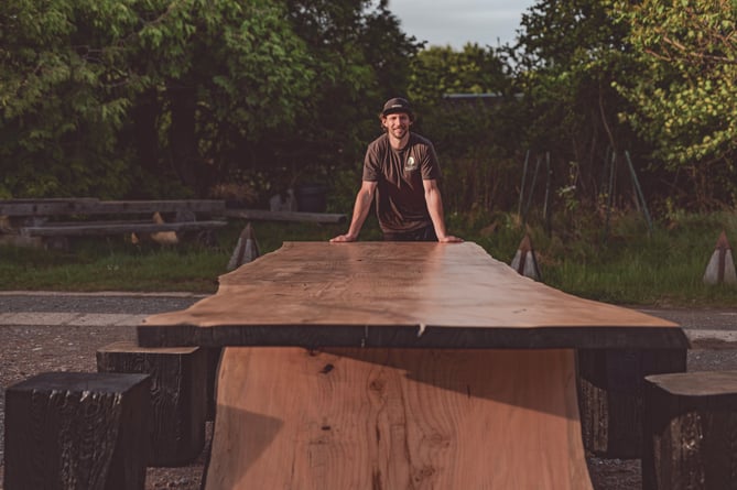 Oli Carter made a single slab table and a sculptural bench for the Chelsea Flower Show