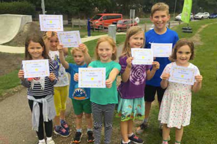 Young walkers show off their certificates after completing two laps of Jubilee Fields in Alton to help raise £1,500 for Home-Start Hampshire on September 3rd 2022. The sponsored walk was organised jointly by Alton Lions and Walk Alton.