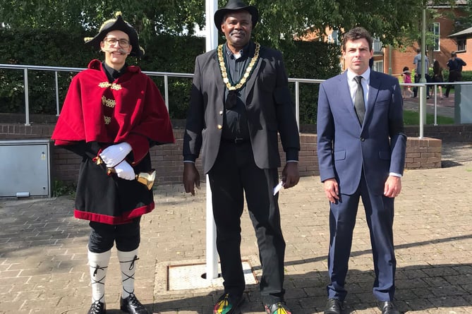From left: Whitehill’s town crier Stuart Morrison, town mayor Cllr Leeroy Scott and town council leader Cllr Andy Tree at the proclamation ceremony for King Charles III outside the Forest Community Centre in Bordon on September 11th 2022.