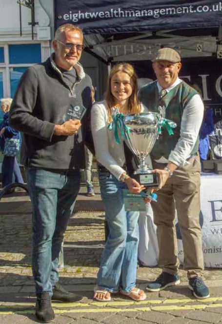 From left: Best in show winner Simon Henderson, his daughter and principal sponsor Dean Phillips at the Alton Classic Car Show.