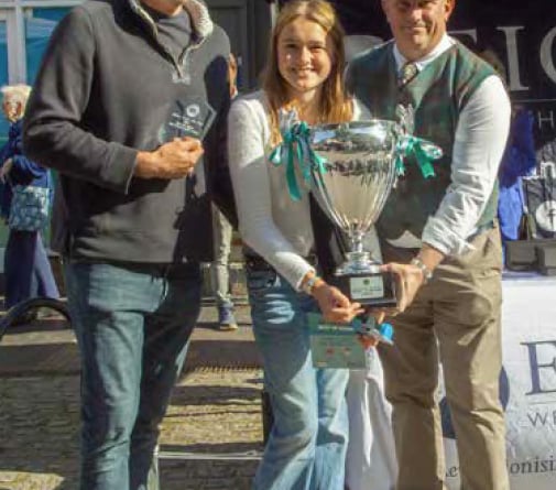 From left: Best in show winner Simon Henderson, his daughter and principal sponsor Dean Phillips at the Alton Classic Car Show.