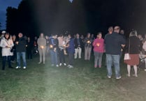 Candlelit silence for Queen in Bordon