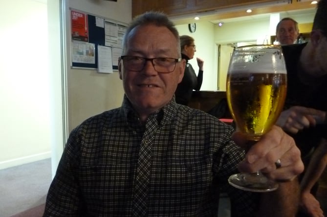 Mike Lyons watching the Queen’s state funeral at Bordon Working Men’s Club on September 19th 2022.