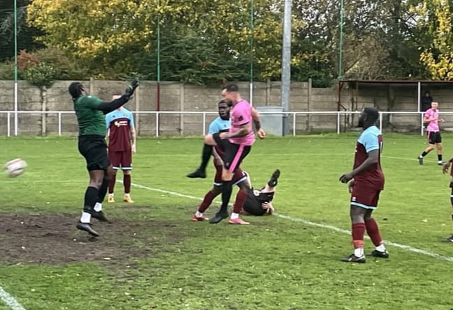 Ashley Lloyd heads Town’s third goal