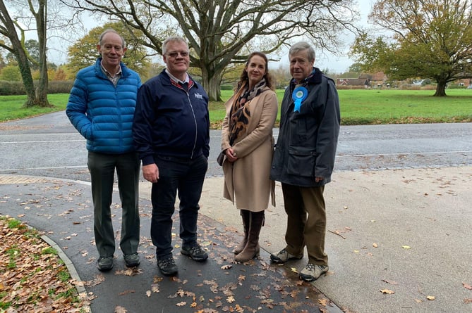 Ian Mitchell (second from left) was pictured campaigning with Tory Party activists last Thursday