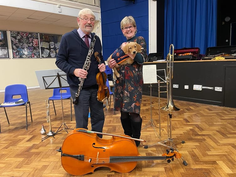 Golden retriever JJ with Clive and Sue from the Basingstoke Symphony Orchestra.