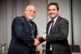 Mike Gatting presents Rowledge wicketkeeper with 'golden gloves' award