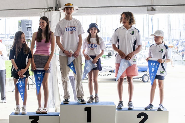 Will and Annabel Shepherd on the podium after their victory