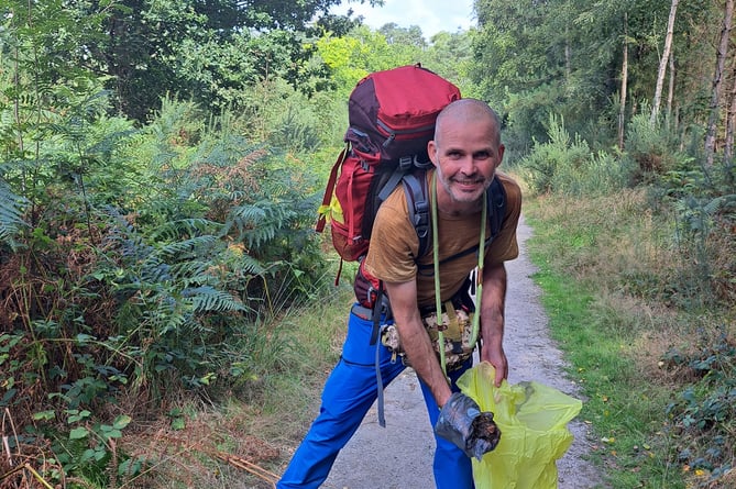 Henry Rawlings collected 40kg of dog poo on his charity South Downs trek