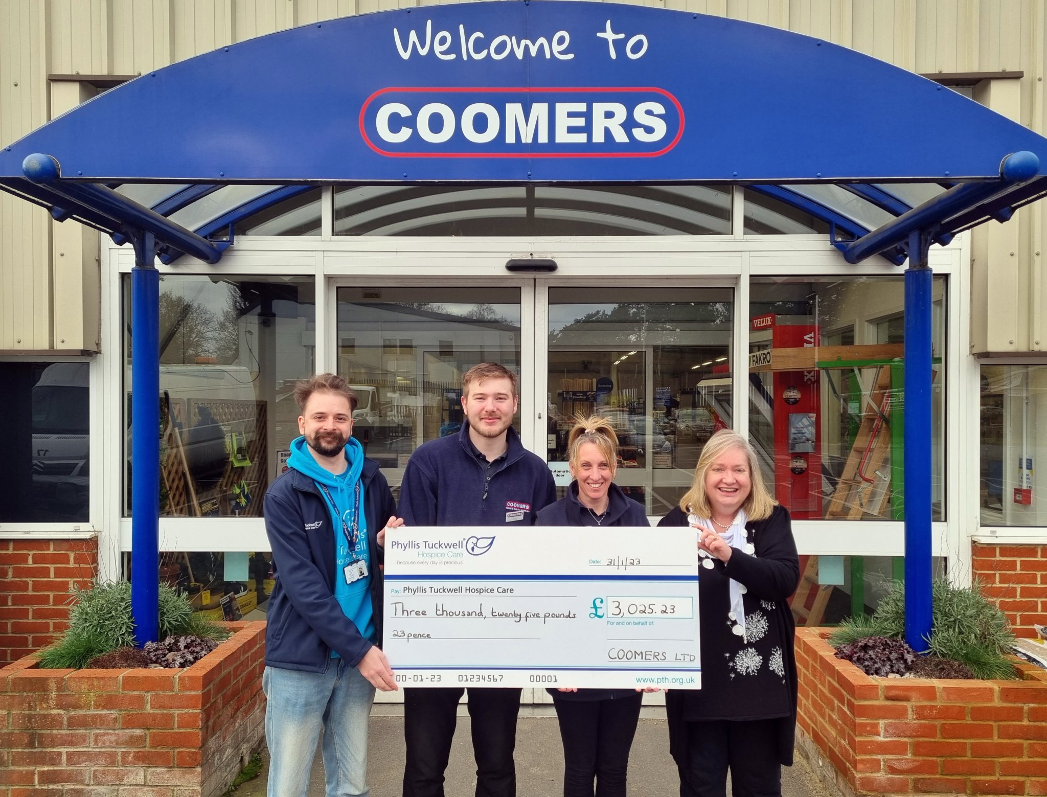 Phyllis Tuckwell’s Tom Enser (left) receives the fundraising cheque