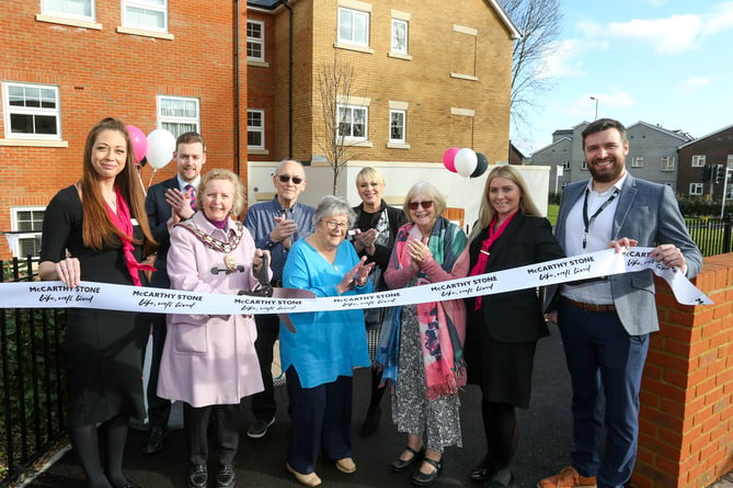 Opening of McCarthy Stone's Queen Elizabeth Place retirement living development in Orchard Lane, Alton, February 2023. From left: Sammy Davidage, Edward Kendall, Ginny Boxall, John Richens, Vera Lipscomb, Catriona Eaton, Dot Kennett, Sophie Hooper and Mike Lebeau.