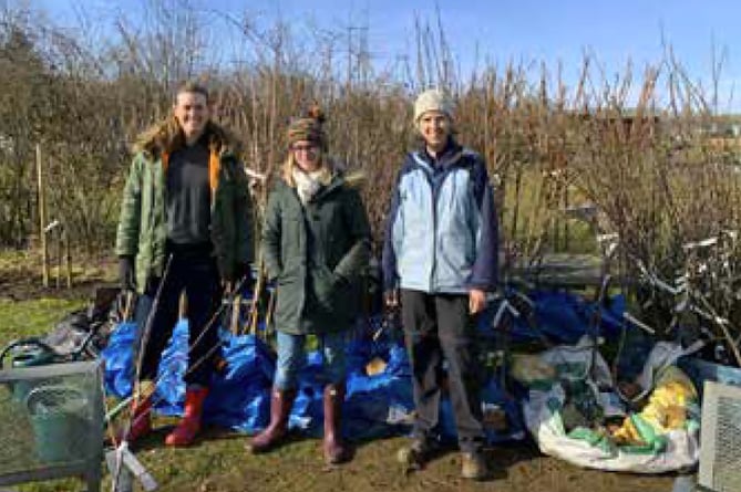 Petersfield Climate Action Network officers with fruit trees at Petersfield Community Gardens, February 11th 2023.