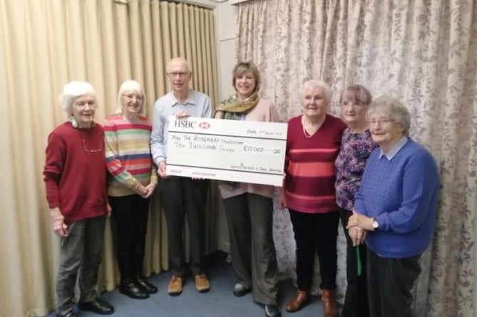 Chase Hospital League of Friends chairman Dr Frank Williams-Thomas presents a cheque for £10,000 to Sally Bull of The Rosemary Foundation, March 2023.
