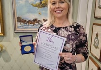 Alton law firm’s practice manager gets highest mark