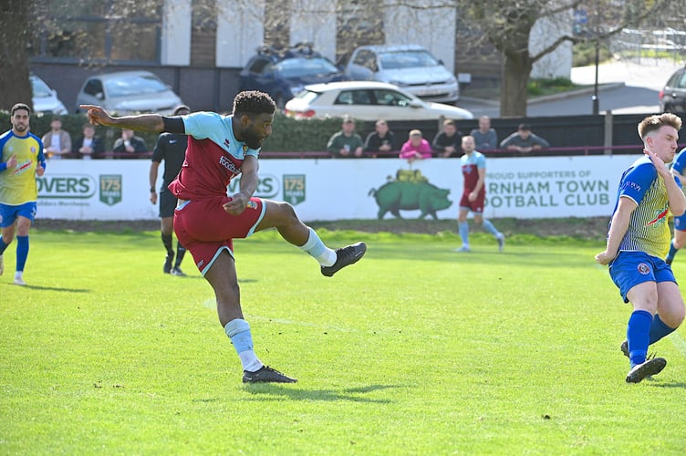 Lamar Koroma volleys Farnham Town in front against Camberley