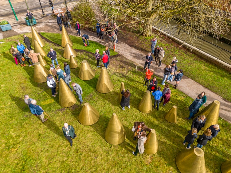 The mysterious golden cones first appeared at Riverside Walk opposite the Farnham Maltings around a month ago, but were only recently ‘launched’ by the mayor of Farnham, Alan Earwaker