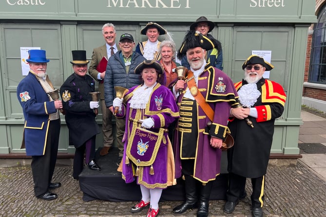 Three pretenders to the throne of Farnham's new town crier were put through their paces in Castle Street last weekend – watched by leading town criers from across the south of England and the mayor of Farnham