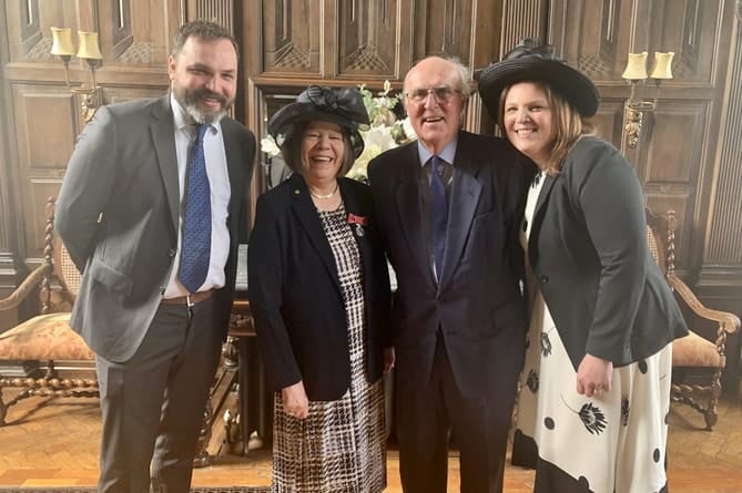 Councillor Carole Cockburn was presented with the British Empire Medal (BEM) by the Lord Lieutenant of Surrey, Michael More-Molyneux, at Loseley Park on March 29, 2022