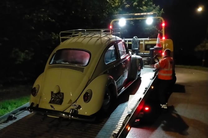 Assheton Le Page's classic 1961 VW Beetle is loaded onto a recovery truck at 2am