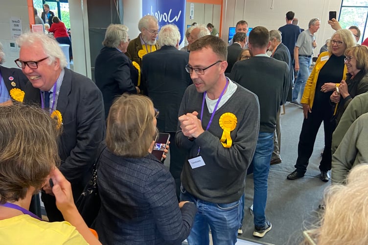 Lib Dem candidate for Chiddingfold, Dave Busby, is congratulated on his election win by fellow Lib Dem Liz Townsend