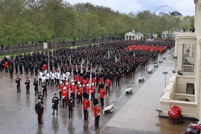 Image of military personnel, seen here at Wellington Barracks in London, before taking part in the King's Coronation.

The UK Armed Forces conduct their largest ceremonial operation for 70 years today (06/05/2023), and accompanied Their Majesties King Charles III and Queen Consort Camilla to the Coronation service at Westminster Abbey.

More than 7,000 soldiers, sailors and aviators from across the UK and Commonwealth participated in ceremonial activities across processions, fly pasts and gun salutes marking the historic event.

With around 200 personnel providing a Guard of Honour at Buckingham Palace, together this made up the largest UK military ceremonial operation for 70 years.

As well as marching detachments from across the Household Division, Royal Navy, British Army and Royal Air Force, more than 400 troops from the Commonwealth nations and British Overseas Territories were on parade, representing the diversity and traditions of Armed Forces around the globe with connections to His Majesty The King.

Foot Guards of the Household Division lined The Mall, the Royal Navy lined their spiritual home at Admiralty Arch, the Royal Marines at Trafalgar Square and the Royal Air Force Whitehall and Parliament Square.


