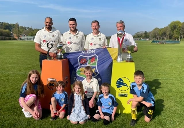 Club overseas signing Bash Walters, first team and club captain Scott Myers, first team player and secretary Michael Heffernan, chairman and groundsman Richard Myers and some of the club’s colts with the Vitality T20 Blast, Charlotte Edwards Cup, Southern Premier Cricket League Division One and Southern League Ground of the Year trophies
