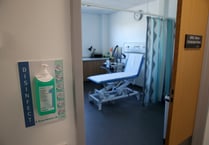 Multiple patients wait 18 months for treatment at the Royal Surrey County Hospital – as Government misses target