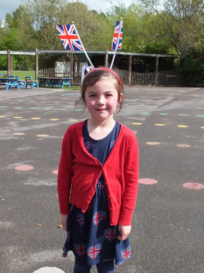 Bordon Infant School pupil in red, white and blue for coronation, May 5th 2023.