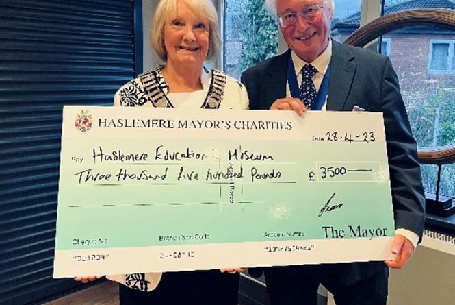 Haslemere's outgoing mayor Cllr Jacquie Keen hands over a cheque for £3,500 to Haslemere Educational Museum trustee Christopher Ashton-Jones