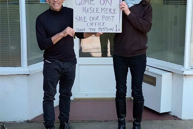 Zara Howard, a member of Jeremy Hunt MP’s Hindhead constituency team, accepting a petition from Haslemere resident Anil Sharma on behalf of the MP