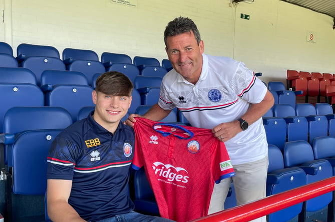 New Aldershot Town signing Josh Stokes with first-team manager Tommy Widdrington
