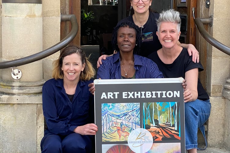 Artists Chloe Scott Moncrieff, Fiona Pearce, Elizabeth Mikellides and Yeside Linney outside Chloe's studio in Odiham High Street.