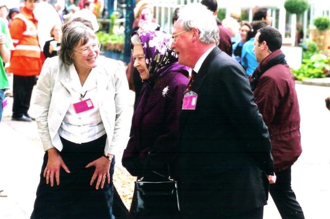 Christopher and Carmen Ashton-Jones pictured with the late Queen