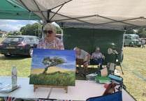 Alton Art Society members paint at Armed Forces Day Convoy event 