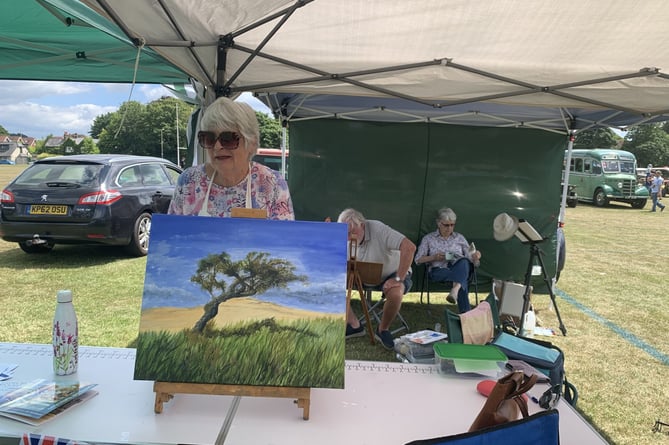 Members of the Alton Art Society show off their work in Anstey Park, June 24th 2023.
