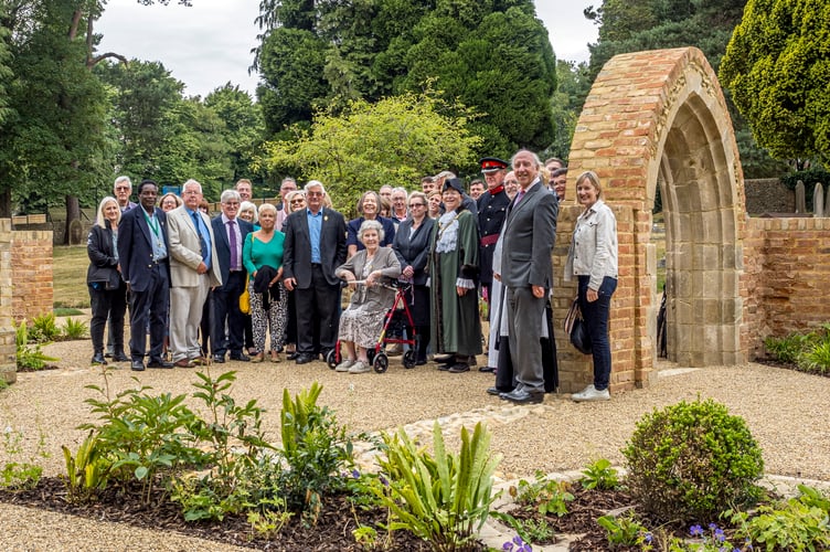 Deputy Lieutenant Bill Biddell and the mayor with guests at the new Hale Chapels Garden