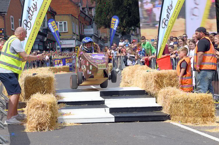 BORDON SOAPBOX

BORDON, HAMPSHIRE
ENGLAND
23rd JULY 2023

On Sunday 23rd July 2023 Whitehill & Bordon in Hampshire was transformed into the ultimate community driven soapbox spectacle, the official Bordon Soapbox Derby

With the main road through the town closed to  traffic the hundreds of spectators were able to walk around the attractions that had been put in place in the early hours of Sunday before gathering many deep on Chalet Hill to watch the 'soapbox racers' take on the challenge to be the fastest competitor to get to the Finish Line ! 

Some of the racers were quick, some were slow, and some driver's after having spectacular spills were permitted to run to the Finish Line as long as they were carrying 'any part of their soapbox' ! 




(Photo by Malcolm Wells)
 
Standard reproduction rates apply, contact Malcolm Wells to arrange payment - Mobile: 07802-217-569 
malcolmrichardwells@gmail.com
